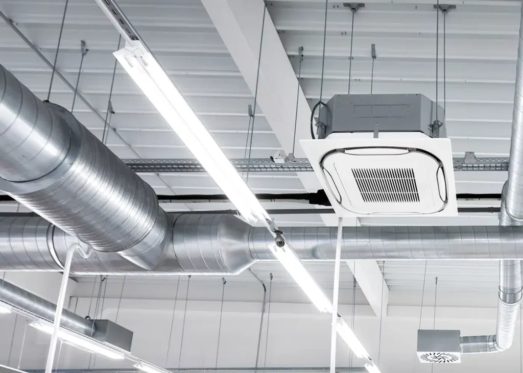 Commercial air conditioning equipment being assessed during a TM44 inspection